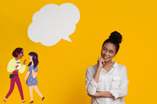 A young woman looking to the right with a empty speech bubble next to her.