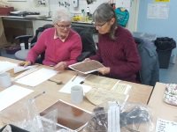 Volunteers carrying out research on John Baxter