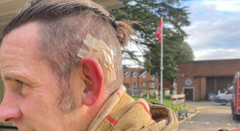 Firefighter with bone implanted hearing aid