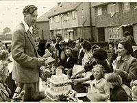 Photo of Mr Blake giving a speech to the Ford Road street party 1953
