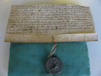 Seal on a 12th century deed of gift by John de Burstow. SHC ref 3128/1