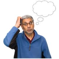 A man touching his head