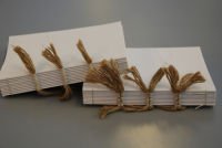 Two book texts showing single and double cord construction.