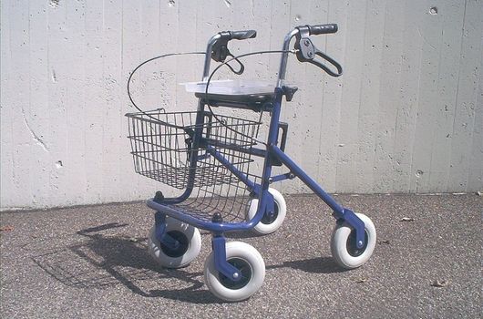 A photograph of an early rollator.