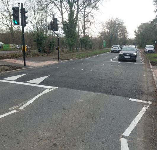Traffic lights with newly painted give way lines