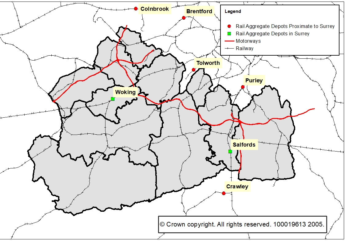 The image shows seven rail aggregate depots in and around Surrey, relative to railway and motorway links. Salfords Rail Aggregates Depot and Crawley Rail Aggregate Depot are situated in the south of Surrey, with Woking Rail Aggregate Depot in the west. To the north of Surrey in the Greater London Area, Tolworth, Purley, Brentford and Colnbrook Rail Aggregate Depots can be found.