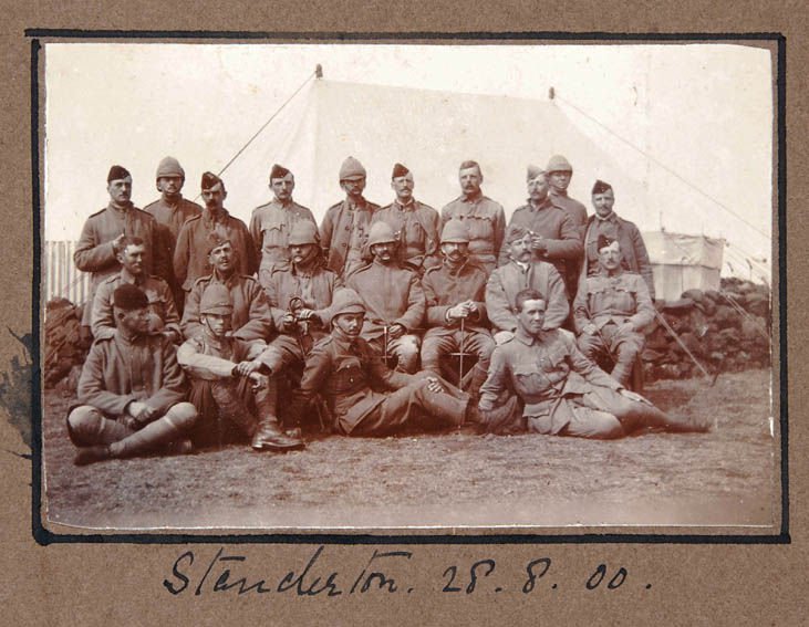 Group photograph, in various styles of service dress, taken in camp in August 1900. SHC ref QRWS/3/11/14/2