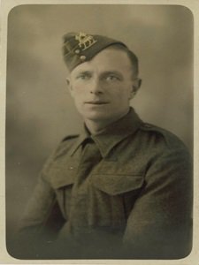 Studio portrait photograph of Frank Brewer smaller