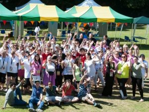 Skill Fest volunteers gather for a team photo in the sun