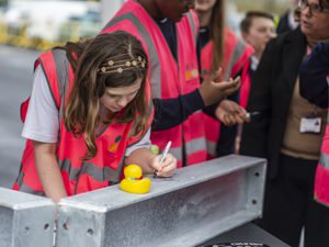 Hopecourt student writes message on steel beam