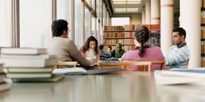 Young people reading in a library