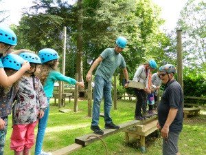 A Family taking part in climbing ativities