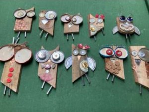 Wooden fence characters, made from discarded pieces of wooden fence