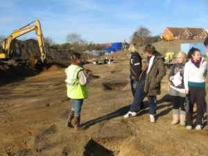 Local residents visiting the site during excavations at St. Ann's Heath Primary School