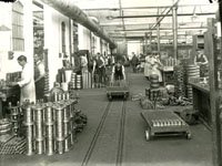 Women working alongside men in the Dennis factory in Guildford, c.1915. (SHC ref 1463/GN/8/2/6)