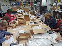 Volunteers re-packaging finds from the Oatlands Palace archive Jan 2020