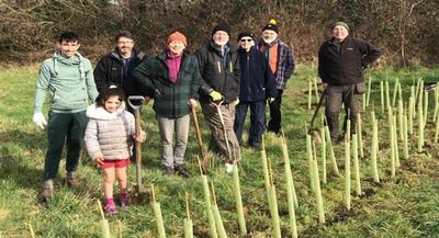 A group of tree planting volunteers in Wonersh, Waverley.