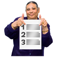 A woman holding up a list